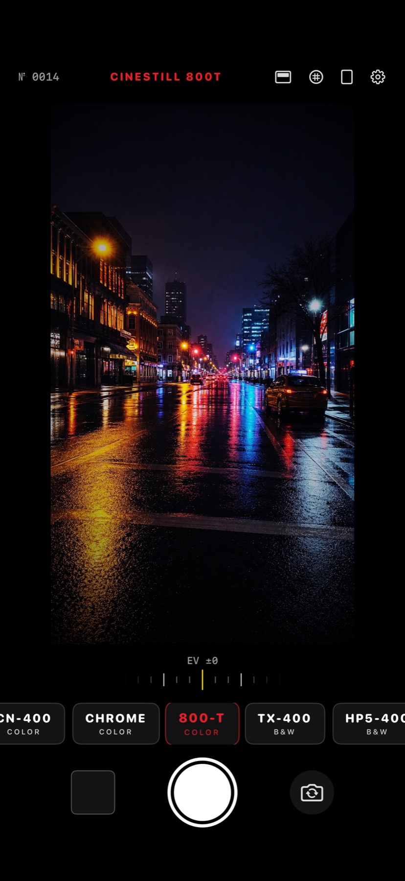 StreetFrame night viewfinder with glowing neon color and visible grain