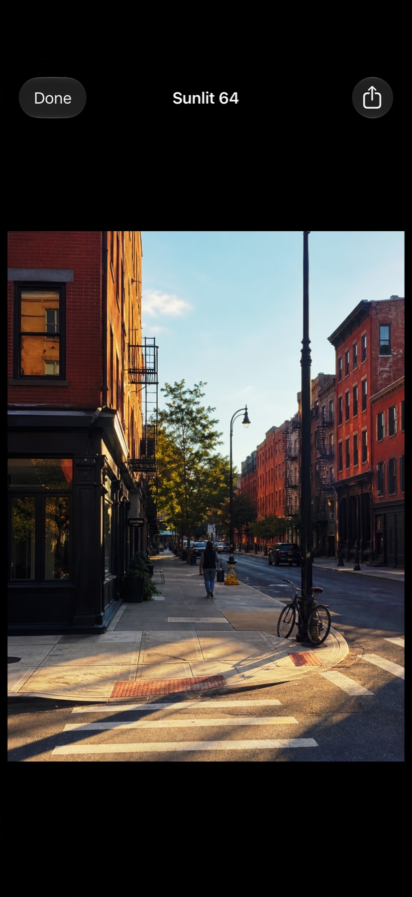 A photo developed with Sunlit 64 inside StreetFrame’s photo import flow